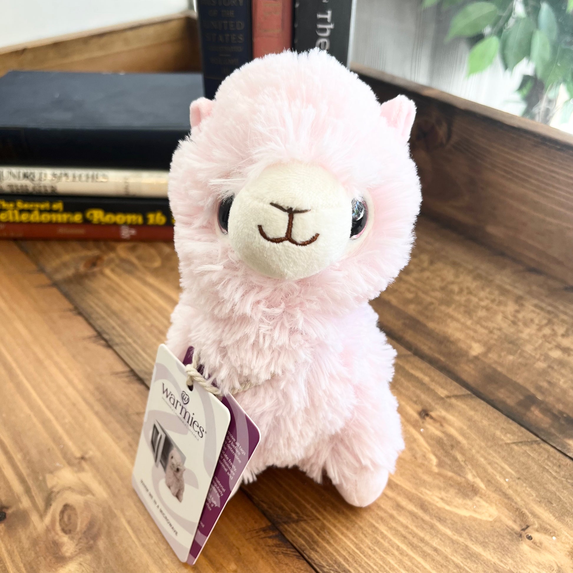 Pink llama top stuffed animal